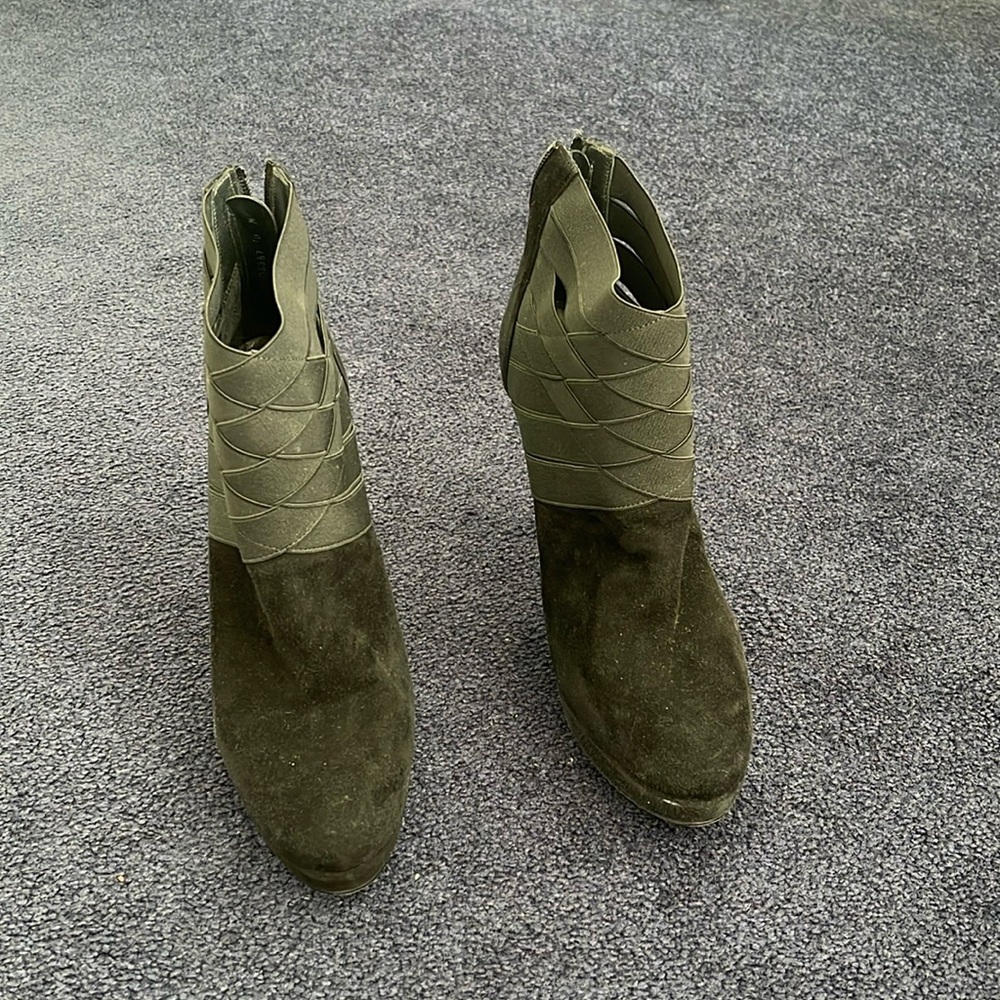 Size 10 Stuart Weitzman Black Papoose ankle boot.